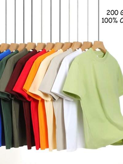 Round Neck 200 GSM Cotton T-Shirts in Multiple Colors Hanging on Rack